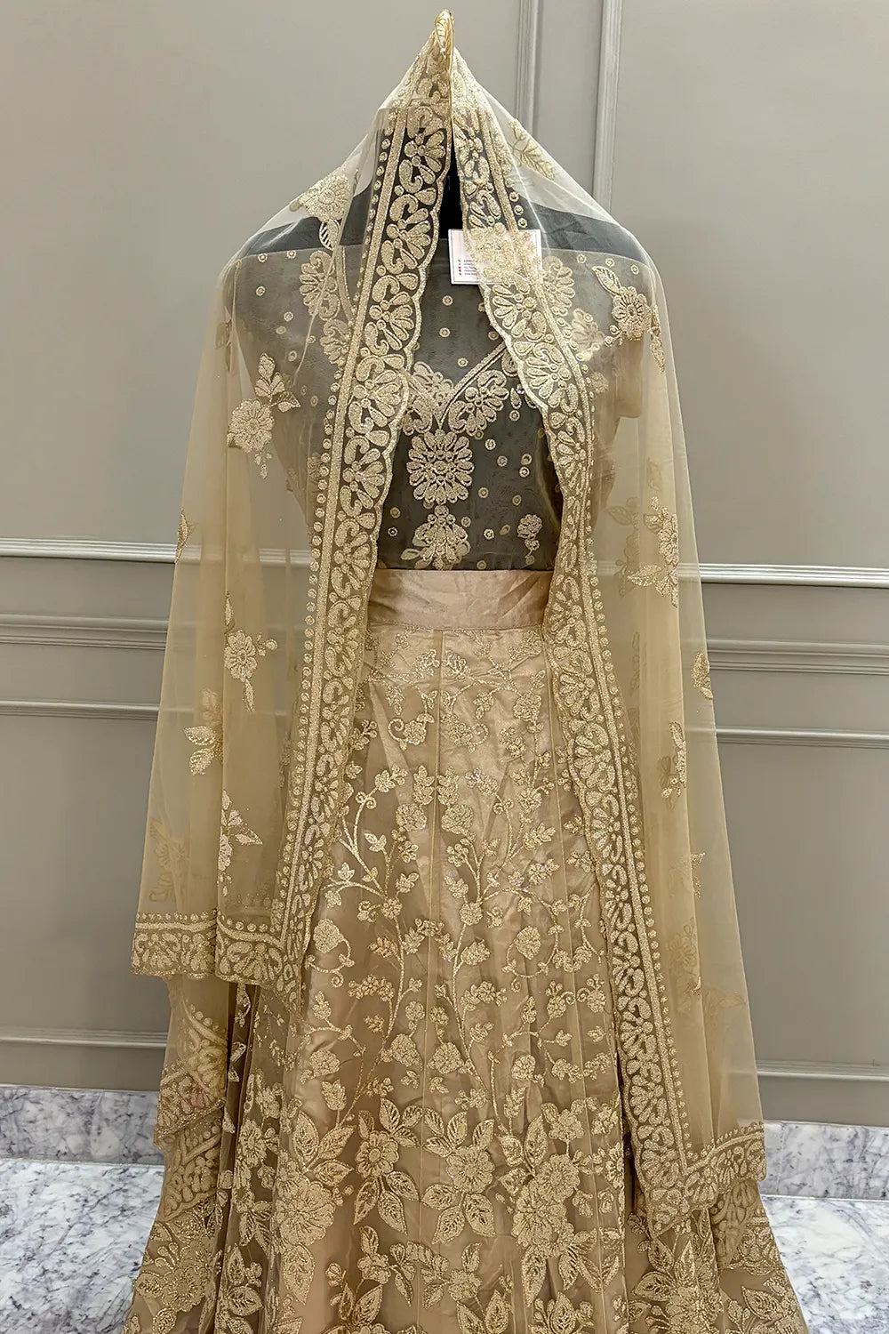 Beige Zariwork Semi Stitched Net Bridal Lahenga