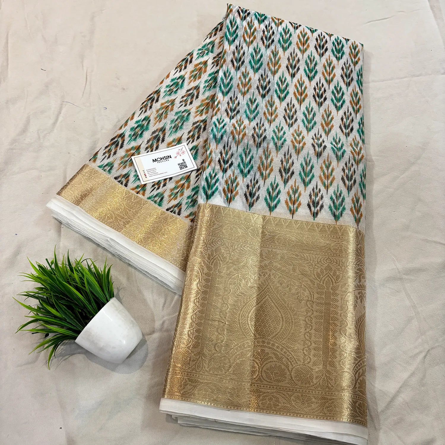 White Sea Green Printed Muga Silk Banarasi Saree