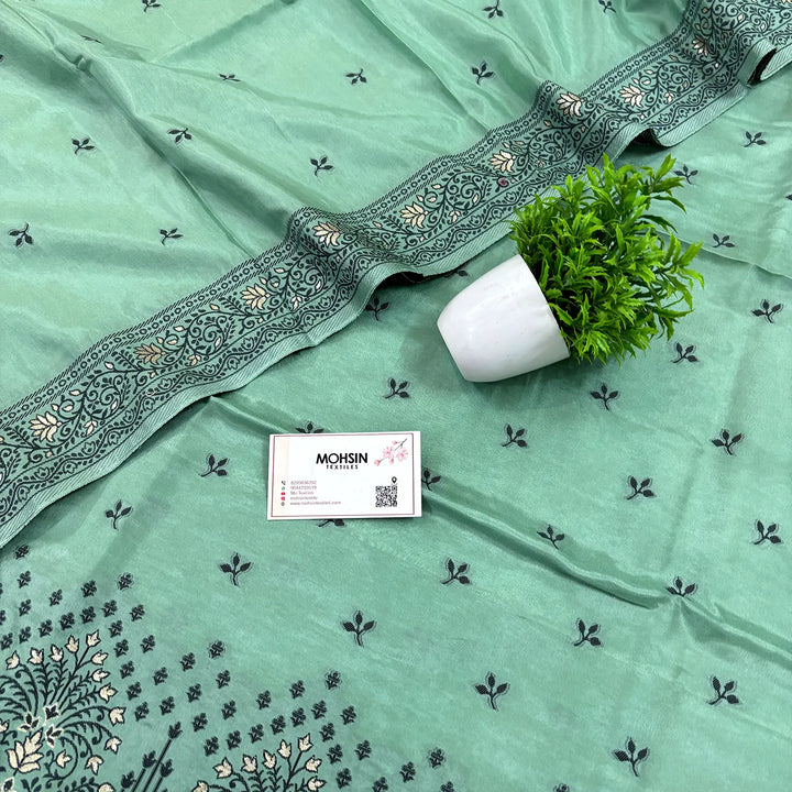 Sea Green Jhilmila Taj Dola Silk Banarasi Suit